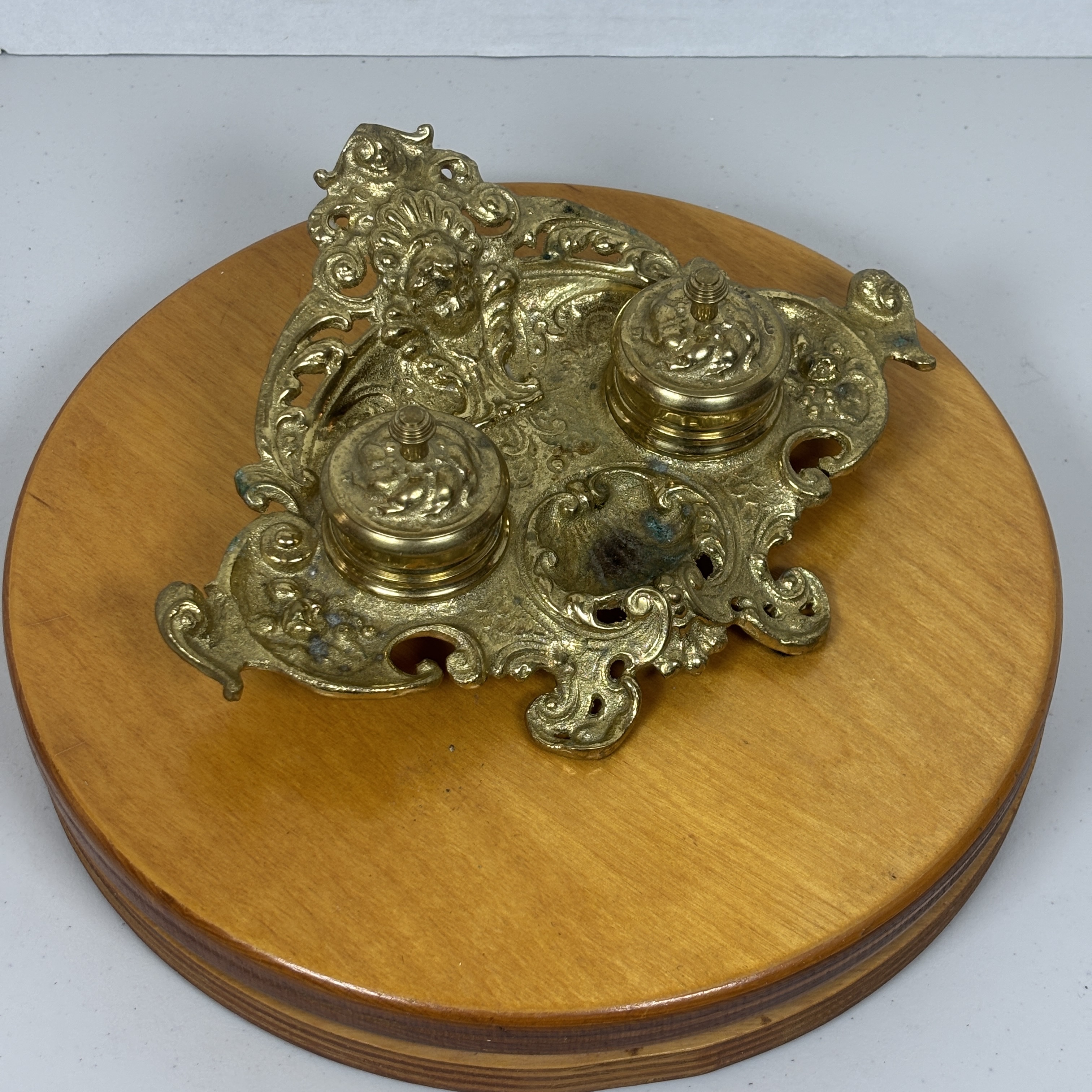 Ornate cast brass double inkwell desk stand