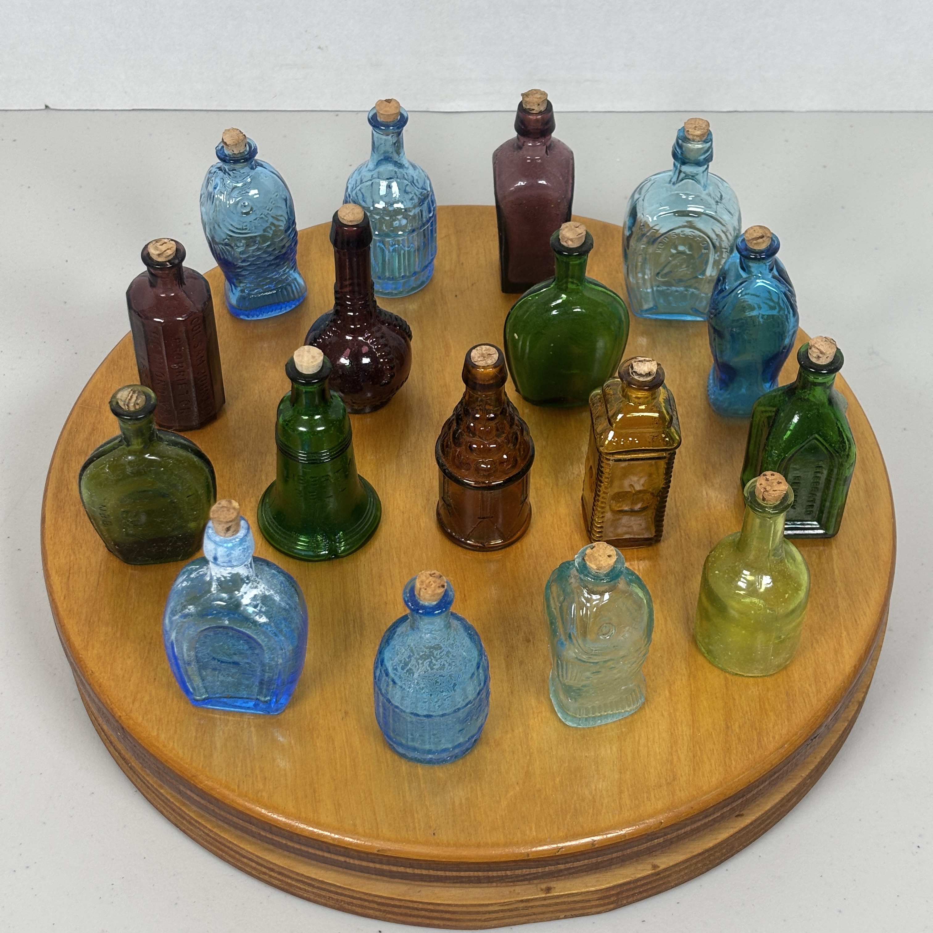 Collection of miniature glass bitters bottles